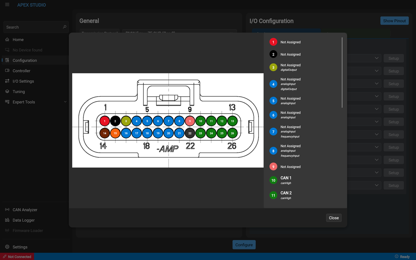 The pinout viewer — a drawing of the 26-pin AMP connector face with two rows of numbered, colour-coded pins, beside a scrolling list giving each pin's current assignment and the capabilities it supports, such as analog input, digital output, frequency input, and the CAN pairs.